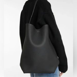 The row tote bag